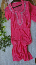 Hot pink Noori premium georgette Chikankari kurta with intricate cutdana embroidery, handmade Lucknow chikankari by LVW Fashions.