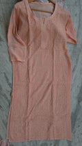 Loveable peach georgette sharara kurti set with intricate handmade Lucknow Chikankari, featuring a premium chikankari kurta and matching sharara.