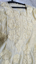 Pastel yellow silk chikankari kurta by LVW Fashions, handmade Lucknow chikankari luxurious kurta with intricate embroidery.