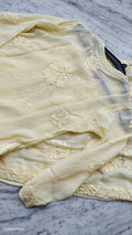 Luxurious pastel yellow silk Chikankari kurta by LVW Fashions, handmade Lucknow Chikankari embroidery, elegant and traditional.