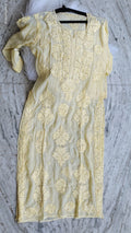 Pastel yellow silk Kurta with intricate Lucknow Chikankari embroidery by LVW Fashions, luxurious handmade Indian ethnic wear.