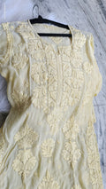 Pastel yellow silk Kurta with intricate Lucknow Chikankari embroidery by LVW Fashions, luxurious handmade chikankari kurta for women.