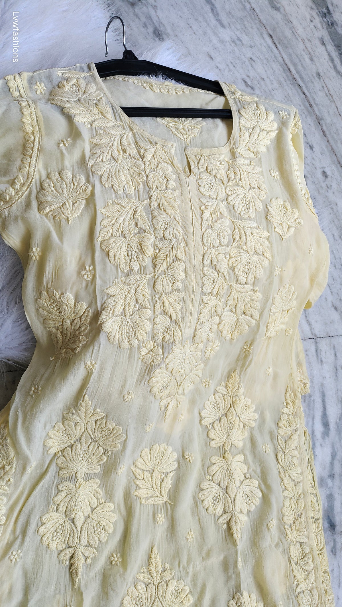 Pastel yellow silk Kurta with intricate Lucknow Chikankari embroidery by LVW Fashions, luxurious handmade chikankari kurta for women.