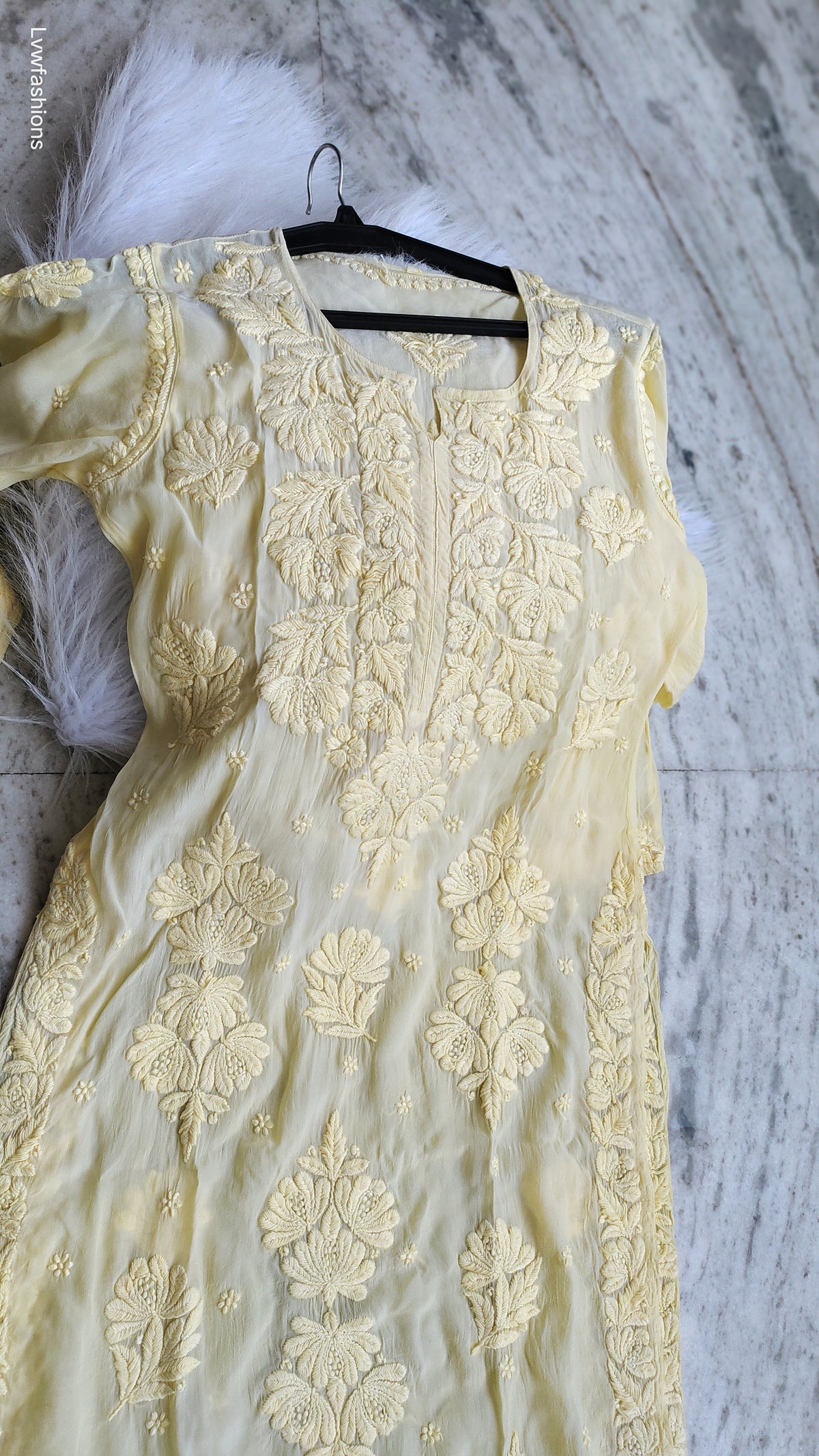 Luxurious pastel yellow silk Chikankari kurta by LVW Fashions, handmade with intricate Lucknow Chikankari embroidery.