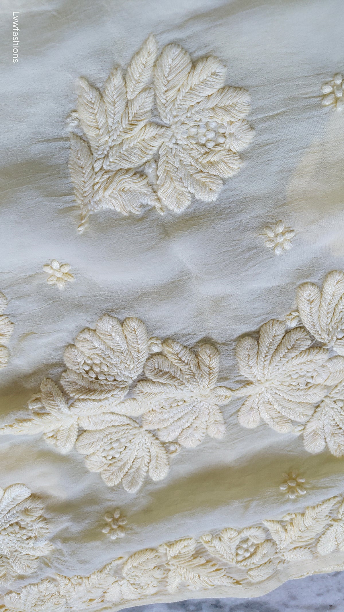 Pastel yellow silk Kurta with intricate Lucknow chikankari embroidery by LVW Fashions, handmade luxurious Chikankari Kurta.