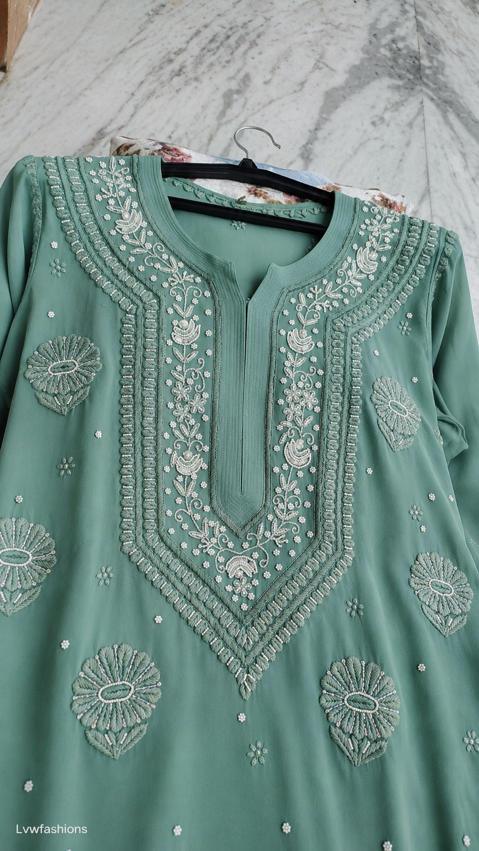 Noori Jade premium georgette Kurta with intricate Chikankari embroidery, pearls, and cutdana embellishments, handcrafted in Lucknow.