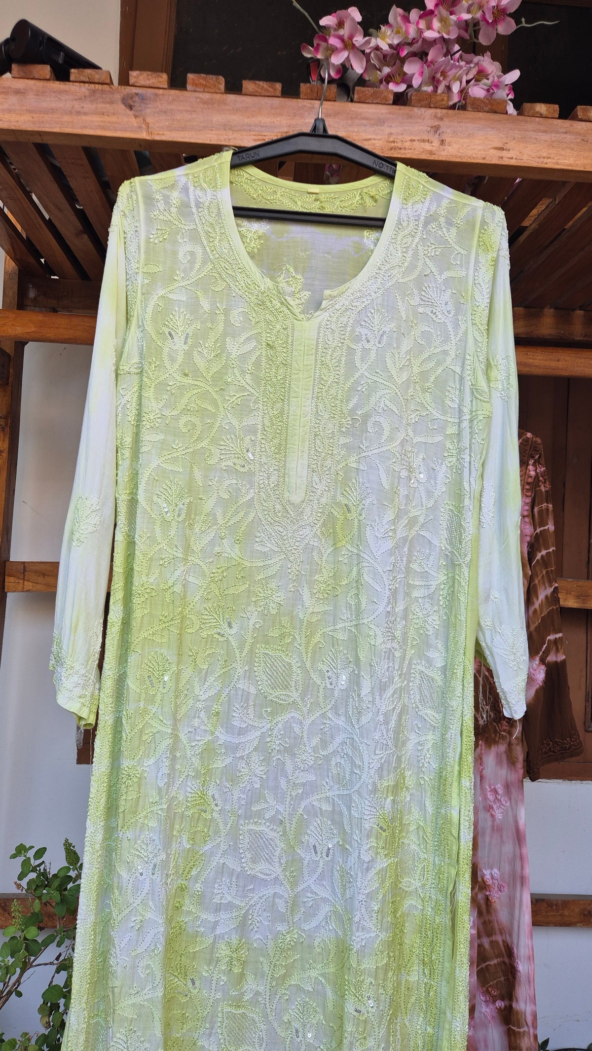 Noori premium mul soft cotton muslin long Chikankari kurta with pearl and cutdana embellishments, handcrafted in Lucknow.