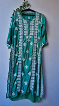 Olive luxury silk long kurti with intricate Lucknow chikankari embroidery by LVW Fashions, handmade and elegant for special occasions.