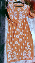 Orange Sunflower Silk Chikankari Kurta by LVW Fashions, handmade Lucknow chikankari embroidered kurta with floral design.