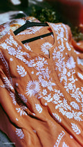 Orange Sunflower premium silk Chikankari Kurta by LVW Fashions with intricate handmade Lucknow embroidery, short sleeves and traditional style.
