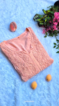 Peach-colored long kurta by LVW Fashions with intricate handmade Chikankari embroidery, made from soft premium modal fabric.