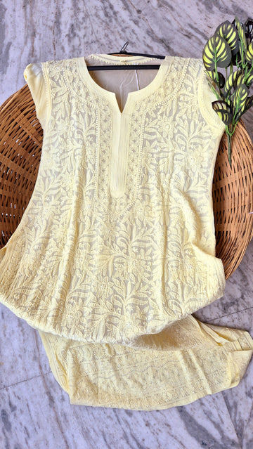 Pearl yellow premium georgette long kurti with intricate handmade Lucknow chikankari from LVW Fashions.