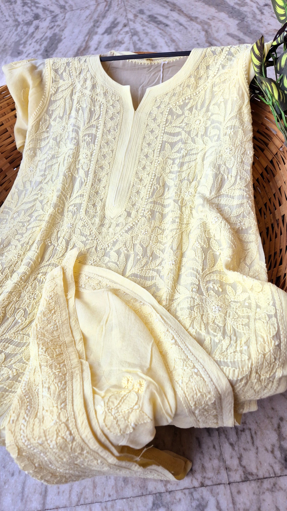 Yellow premium georgette chikankari long kurti with intricate handmade Lucknow-style embroidery by LVW Fashions.