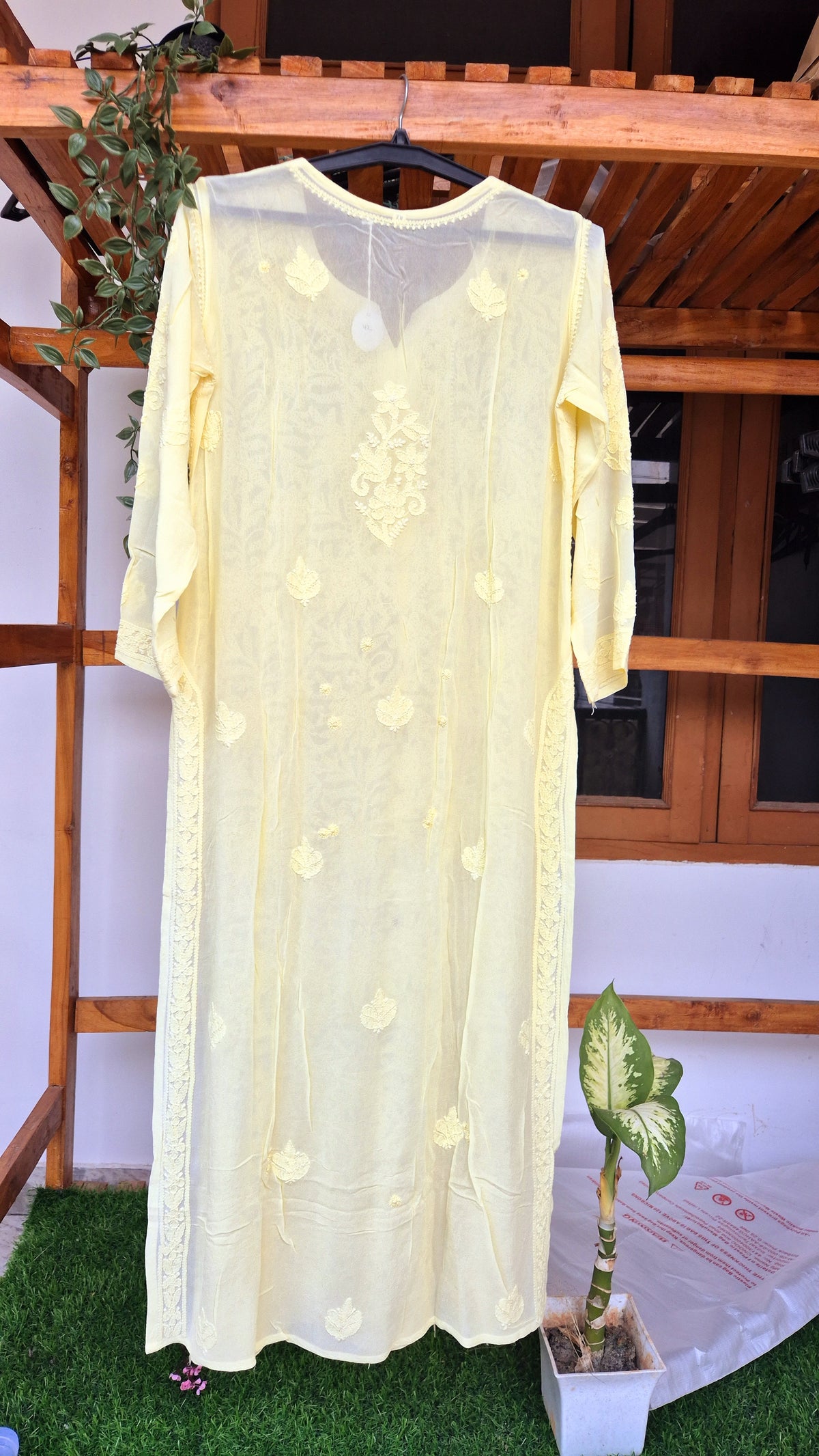 Pearl yellow premium georgette long kurti with intricate chikankari embroidery, handmade by LVW Fashions from Lucknow.