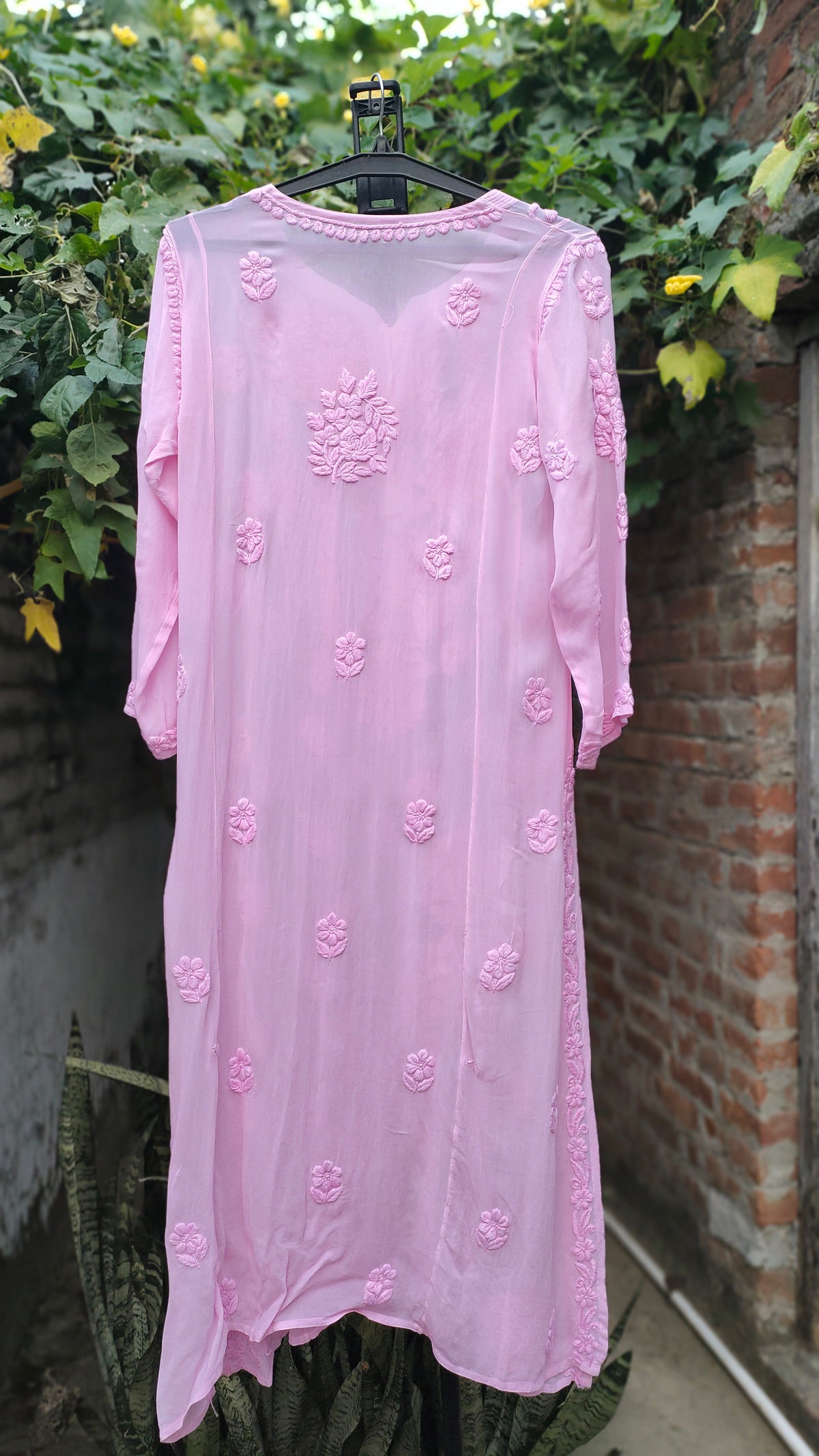 Pink Saba Gulab pastel georgette kurta with intricate handmade Lucknow Chikankari embroidery by LVW Fashions.