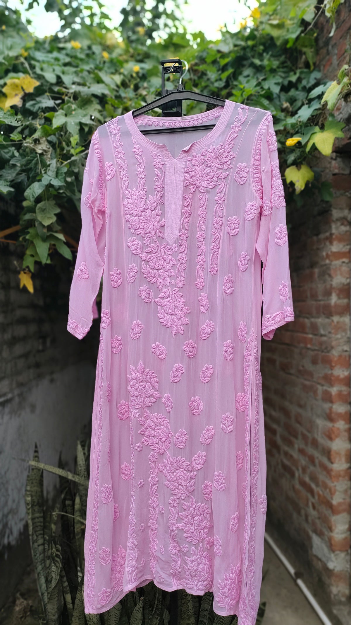 Pink Saba Gulab pastel georgette kurta with intricate handmade Lucknow Chikankari embroidery by LVW Fashions.