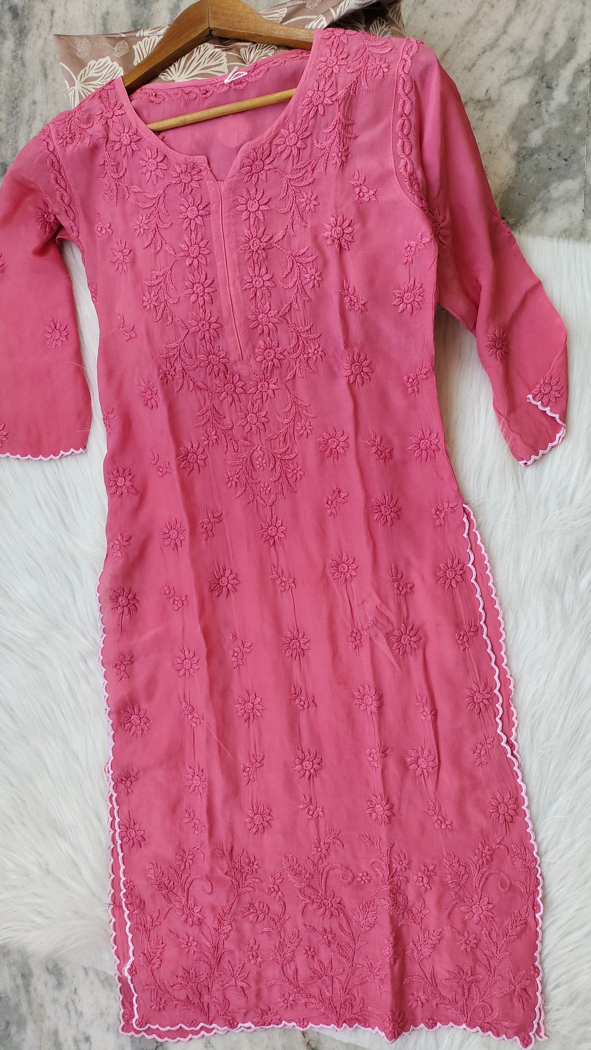 Pink handmade Chikankari kurta by LVW Fashions featuring intricate Lucknow-style embroidery on premium silk fabric.