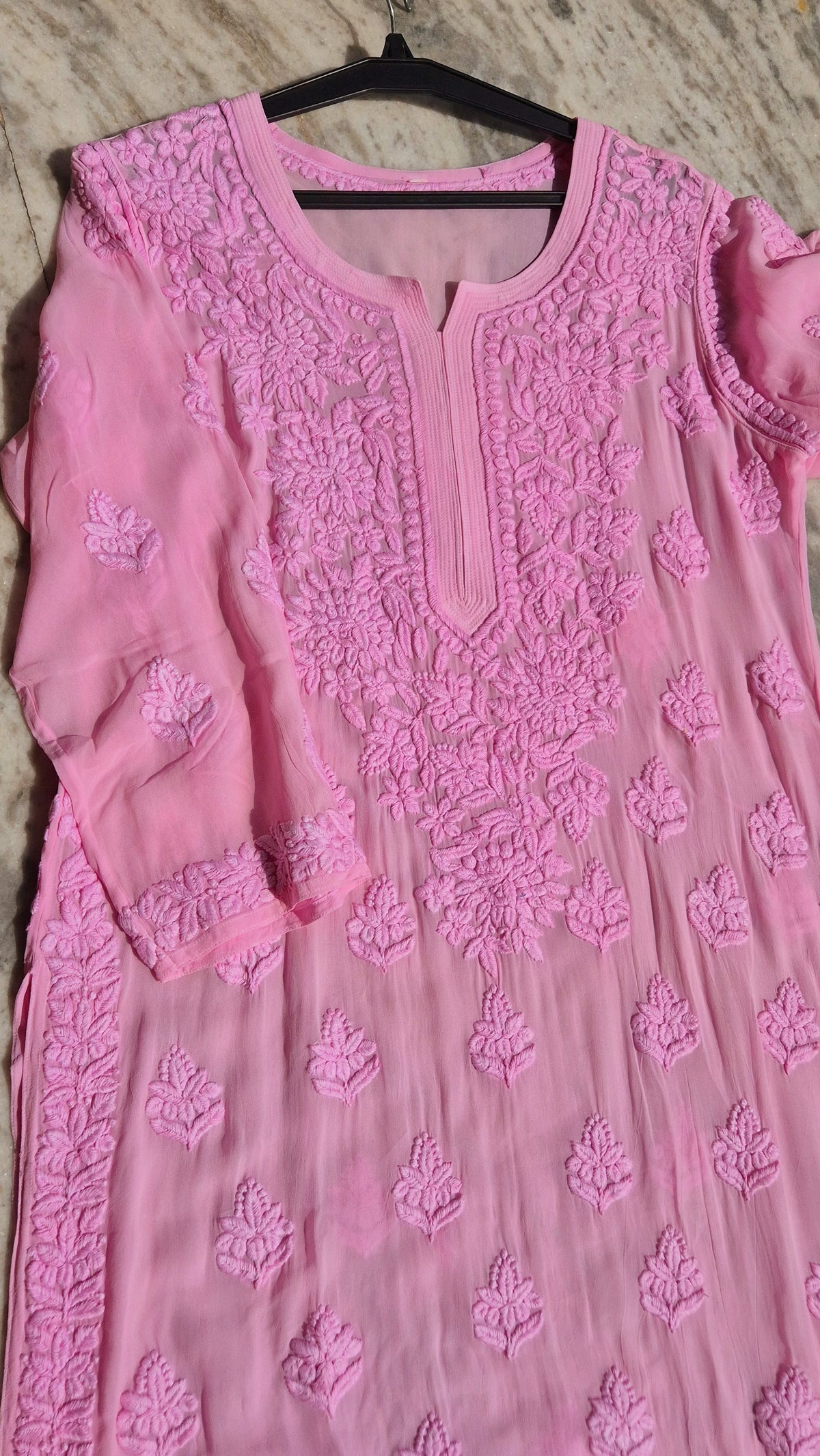 Pinkish premium georgette long kurti with intricate handmade Lucknow chikankari embroidery by LVW Fashions.