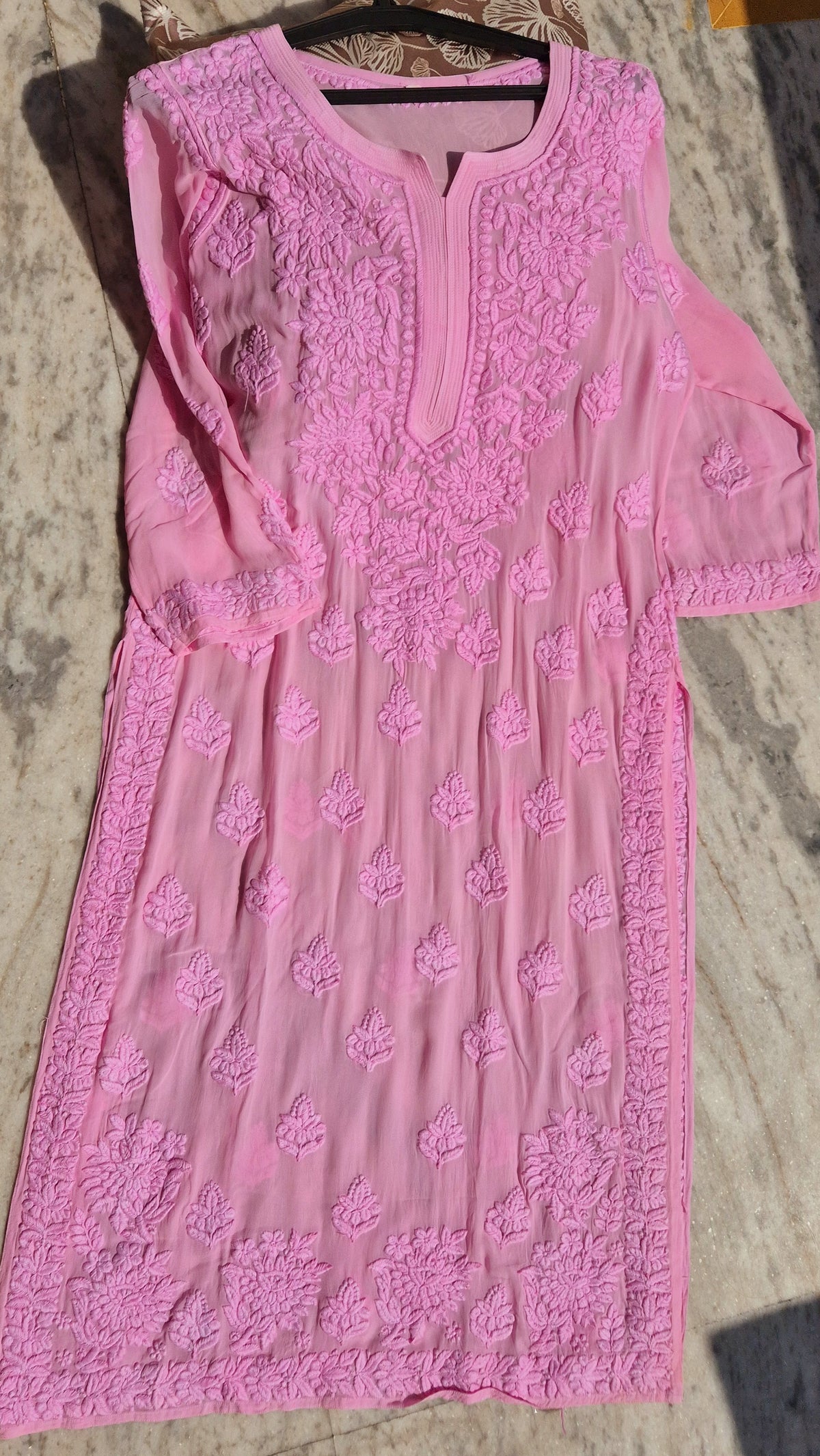 Pinkish premium georgette long kurti with intricate handmade Lucknow chikankari embroidery from LVW Fashions.
