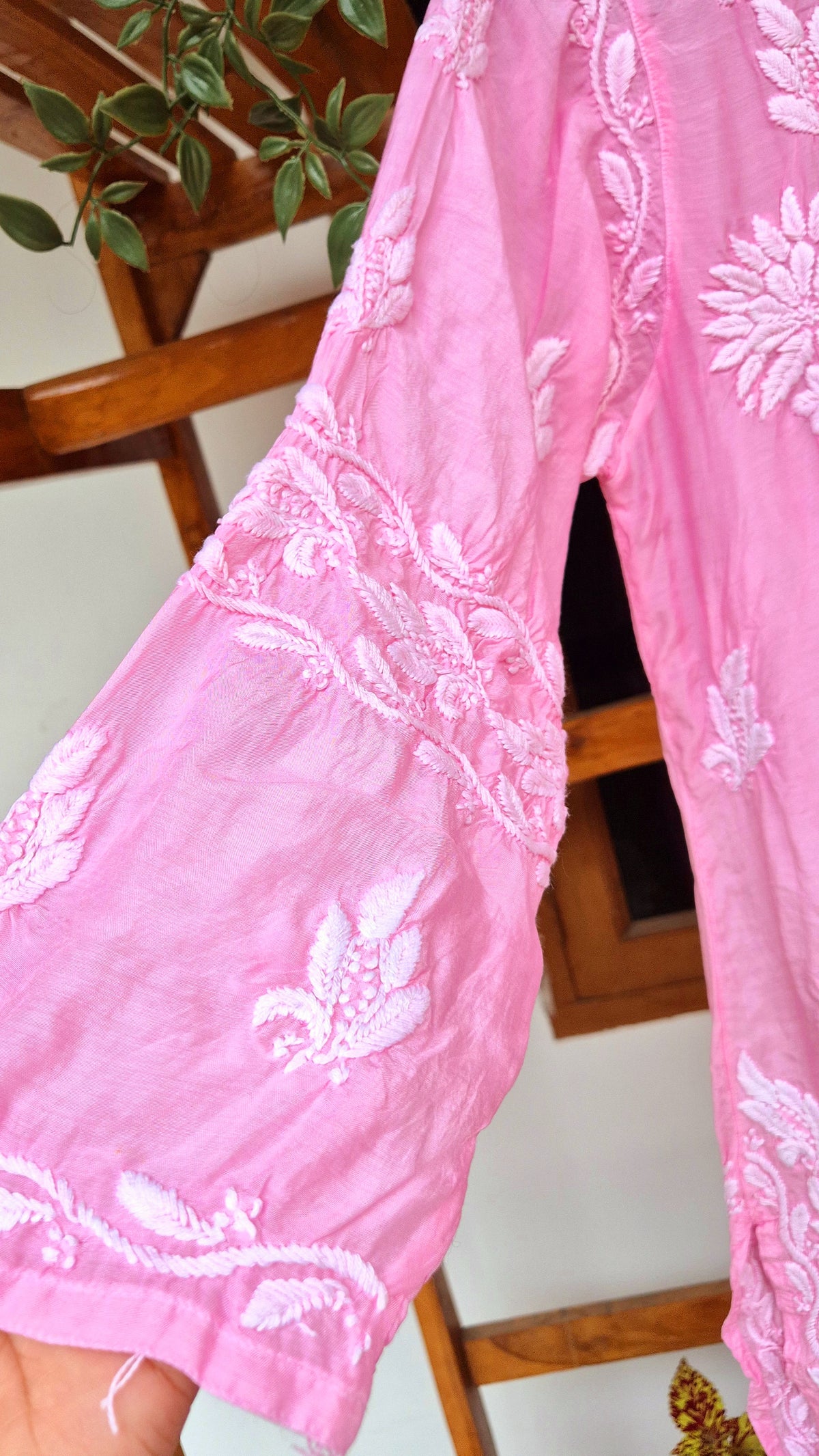 Pinkish premium silk long kurti with intricate handmade Lucknow chikankari embroidery by LVW Fashions.