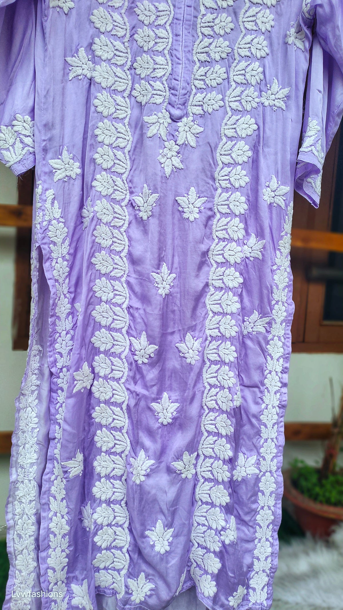 Plum purple luxury silk Chikankari kurta by LVW Fashions featuring intricate handmade embroidery and a luxurious look.