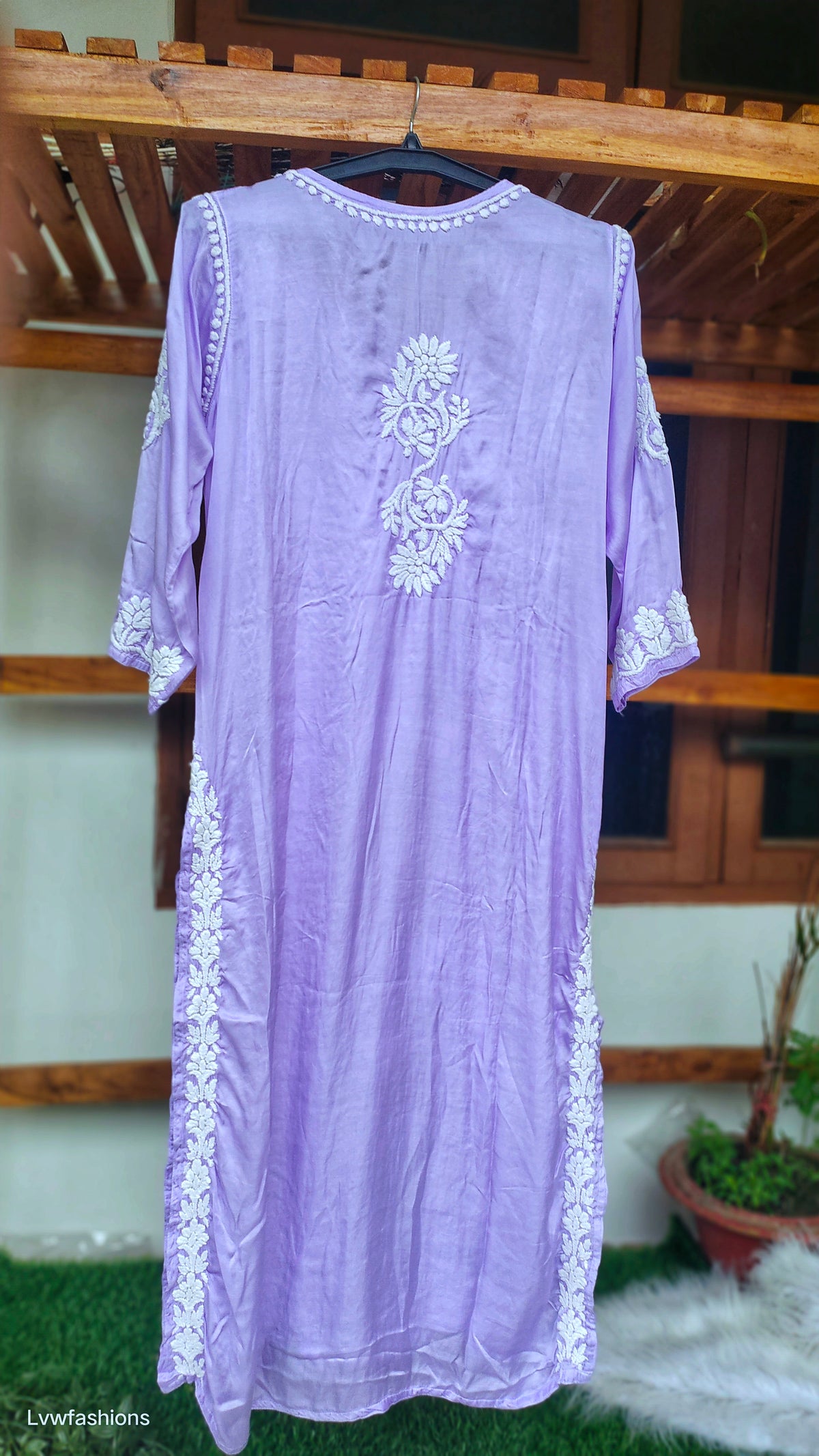 Plum purple silk chikankari kurta by LVW Fashions featuring intricate handmade Lucknow embroidery and luxurious look.