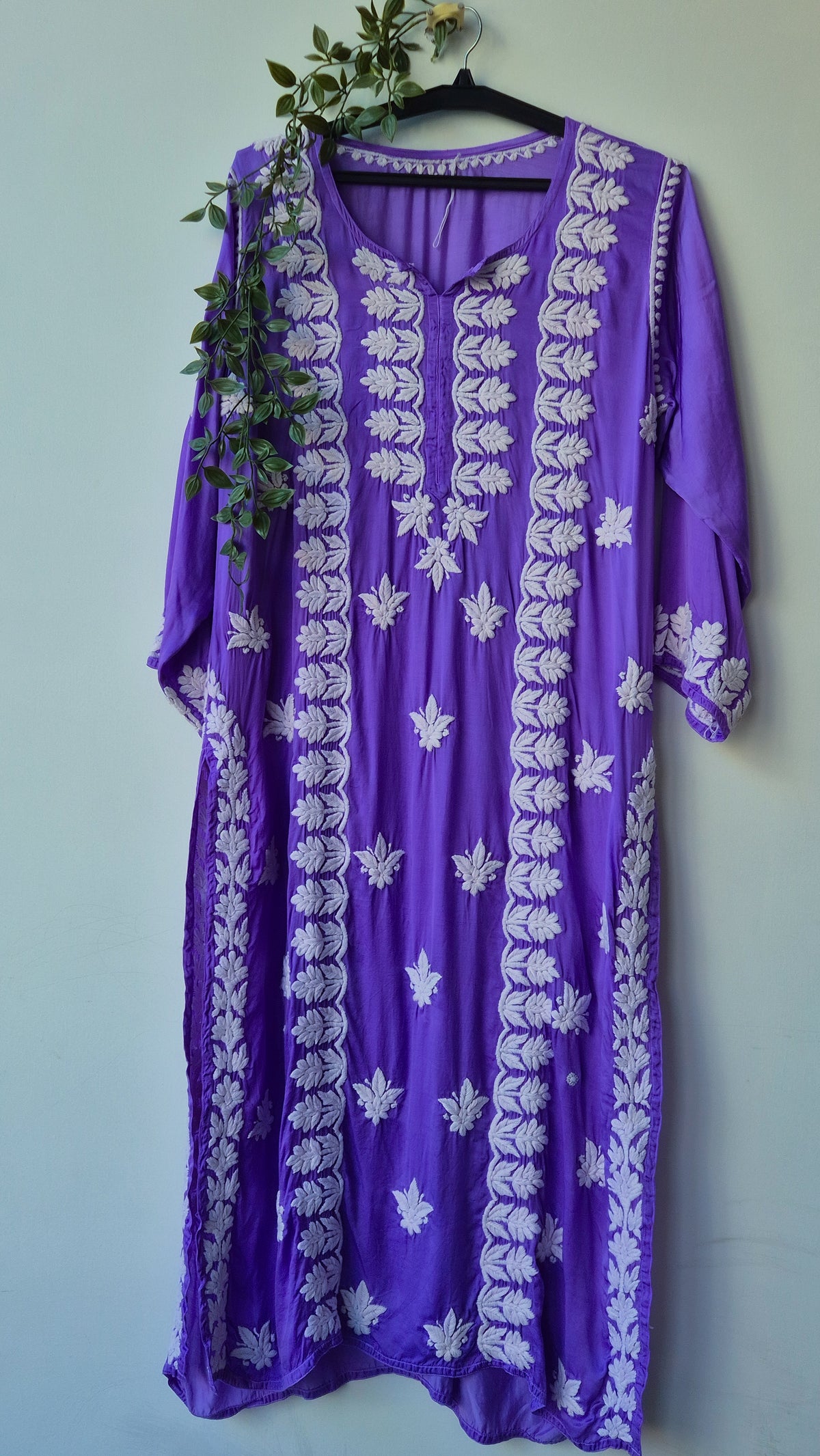 Plum purple silk long kurti with intricate handmade Chikankari embroidery from LVW Fashions, traditional Lucknow style.