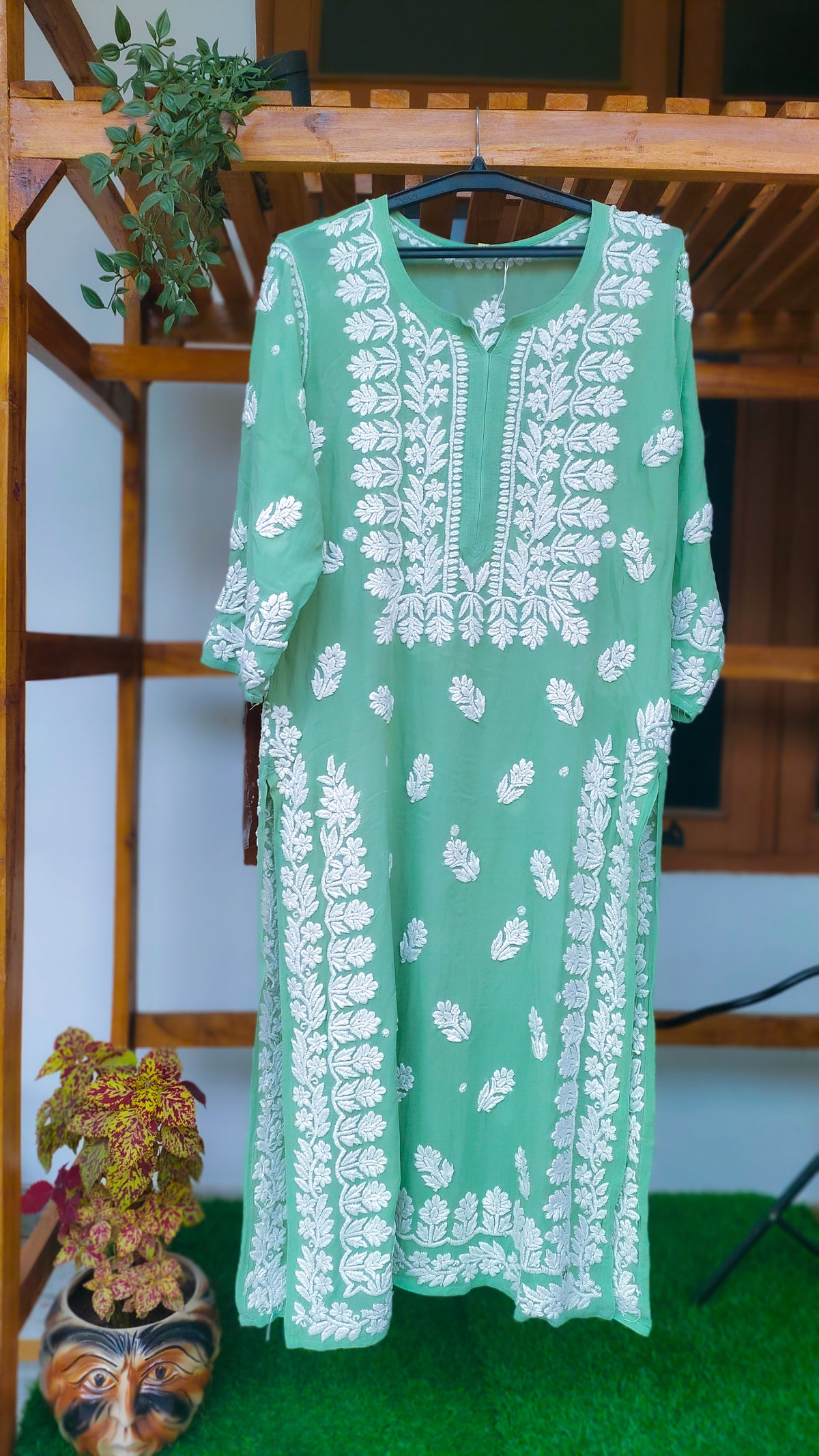 Polished Pine premium georgette long Kurti with intricate handmade Lucknow Chikankari embroidery by LVW Fashions.