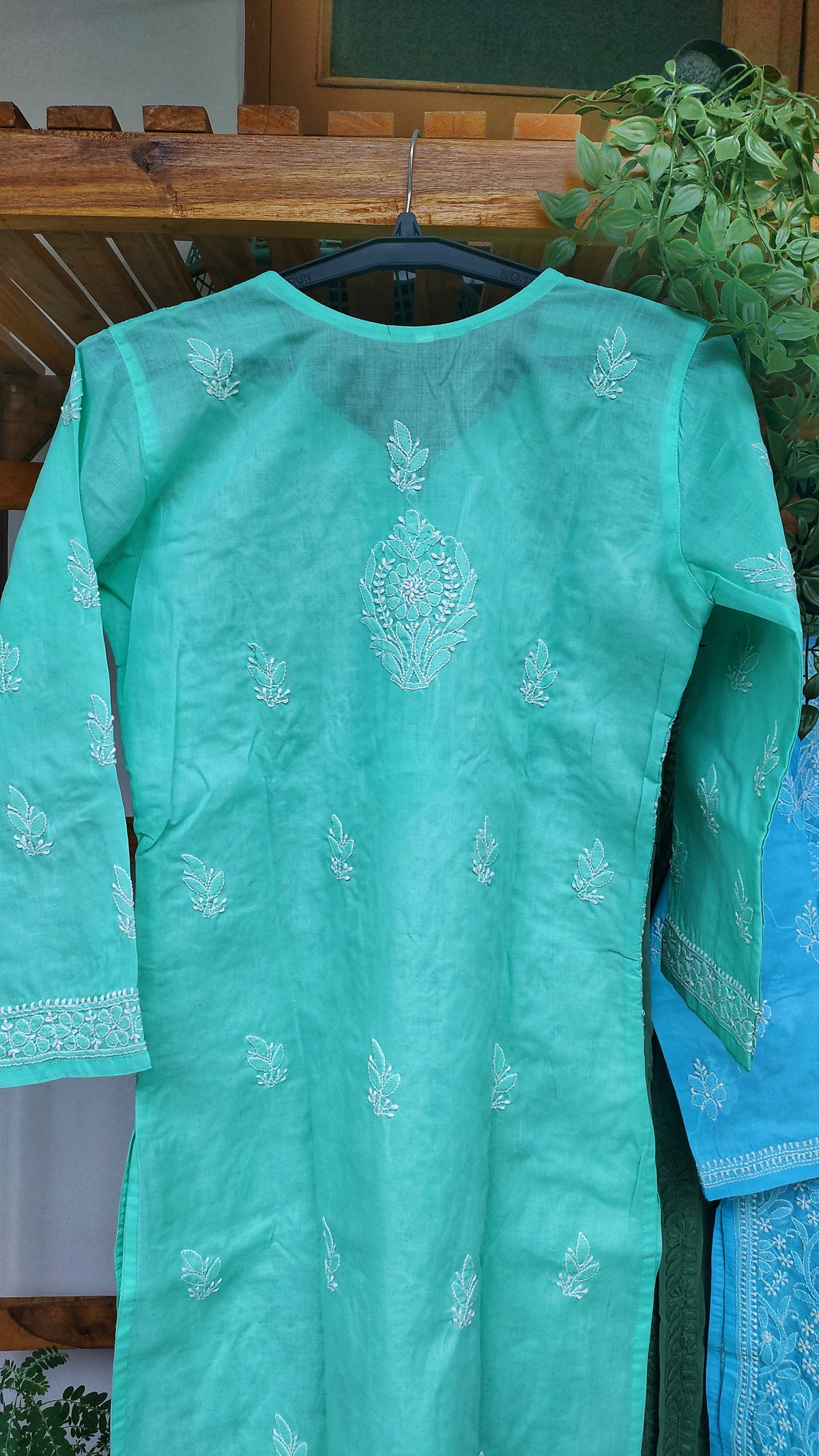 Handmade LVW Fashions premium voil cotton Chikankari long kurta with back daman embroidery, showcasing intricate Lucknow-style embroidery.