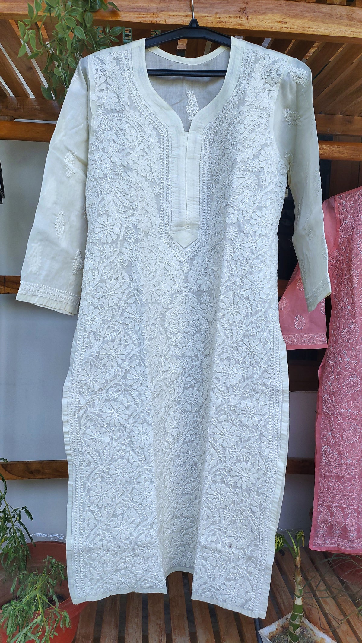 Ivory voil cotton long kurta with intricate handmade Lucknow chikankari embroidery by LVW Fashions.