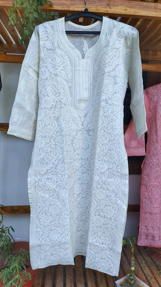 Ivory voil cotton long kurta with intricate handmade Lucknow chikankari embroidery by LVW Fashions.