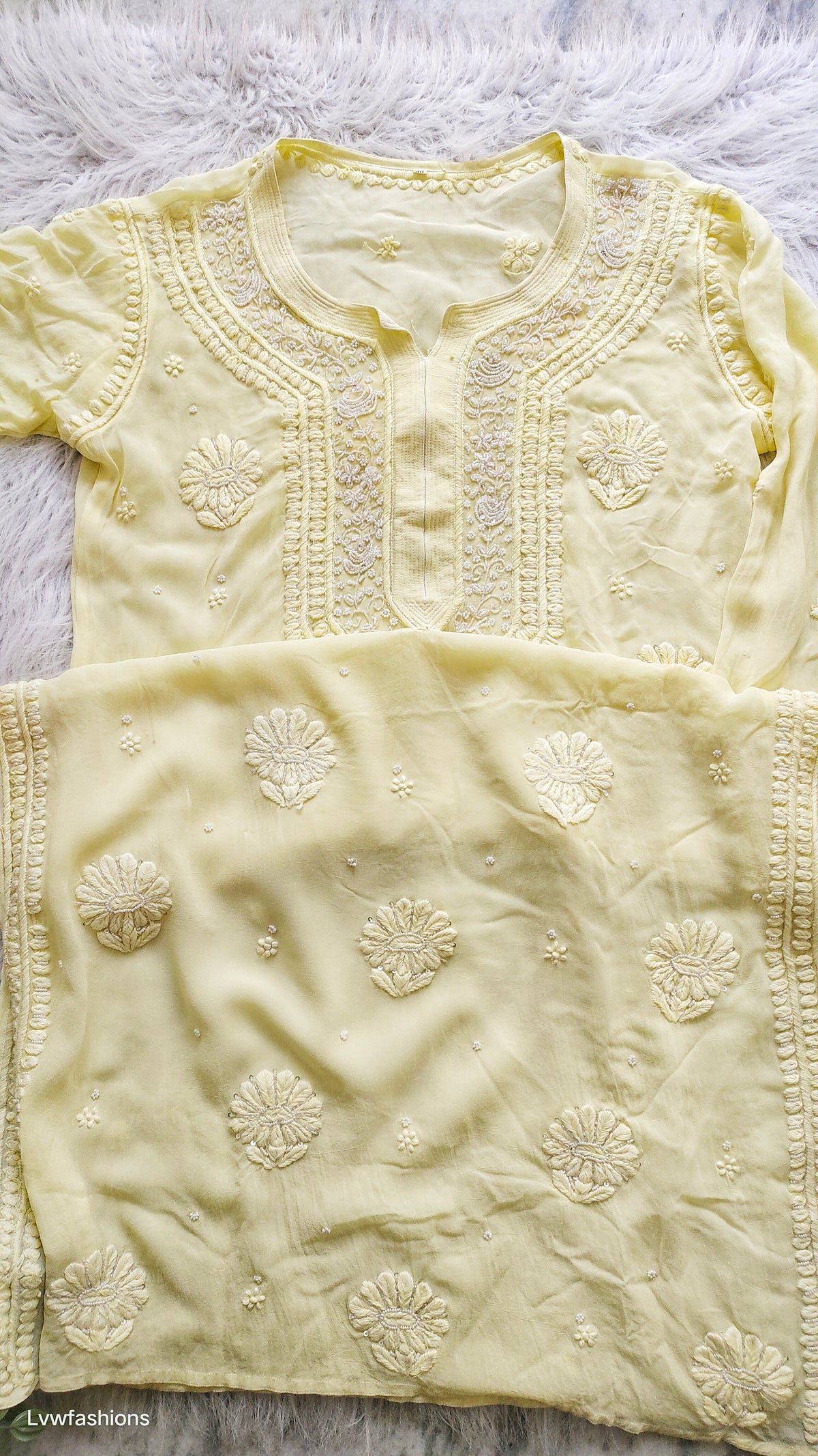 Noori yellow premium georgette Chikankari kurta with intricate cutdana embroidery, handcrafted in Lucknow by LVW Fashions.