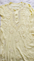 Noori yellow premium georgette Chikankari kurta by LVW Fashions with intricate cutdana embroidery, handmade Lucknow Chikankari.