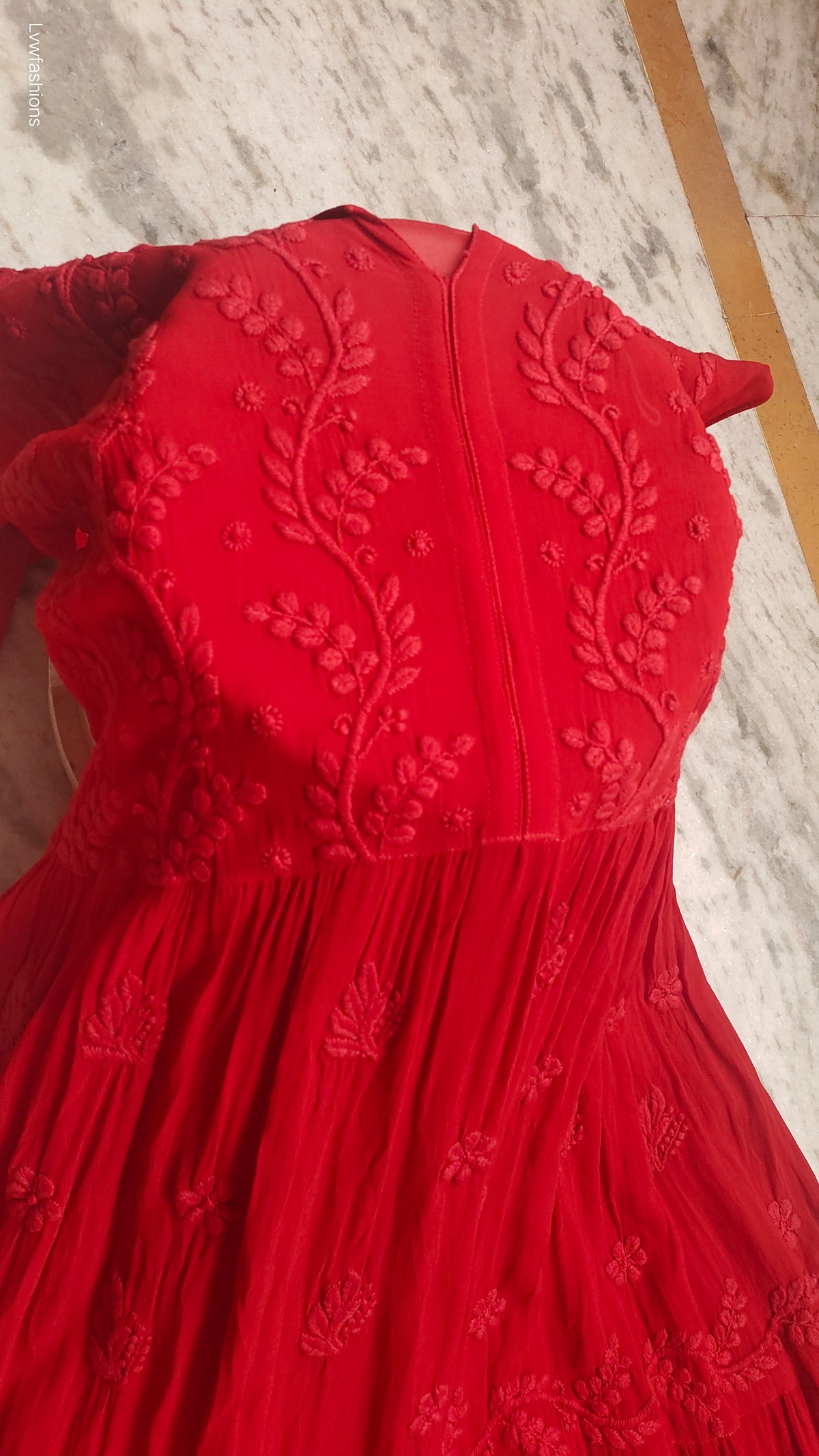 Red premium georgette Chikankari gown by LVW Fashions, featuring intricate handmade Lucknow Chikankari embroidery.