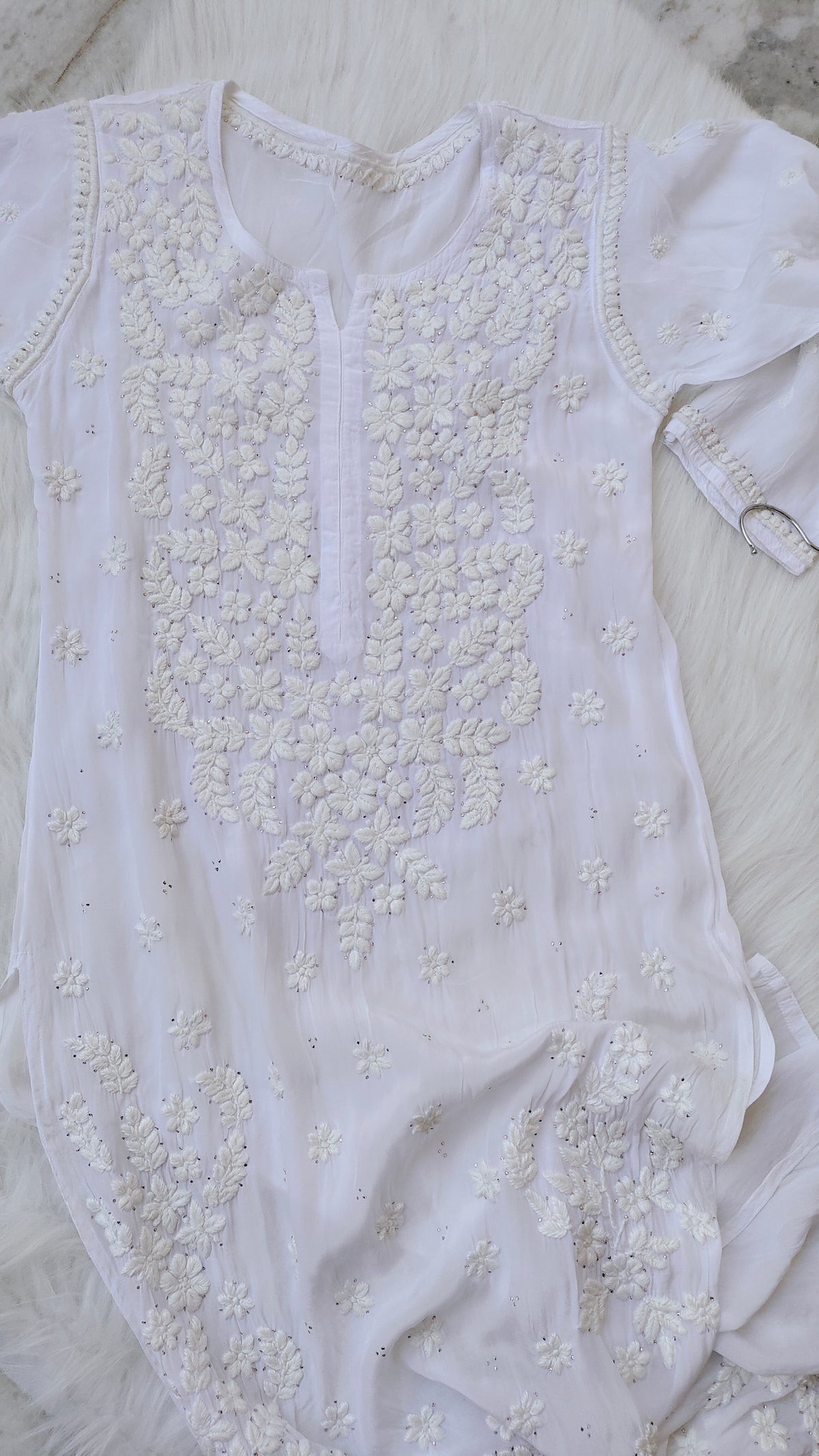 Beautiful white Safed Premium Georgette Chikankari long kurta with intricate Lucknow-style embroidery and Kamdani add-on by LVW Fashions.