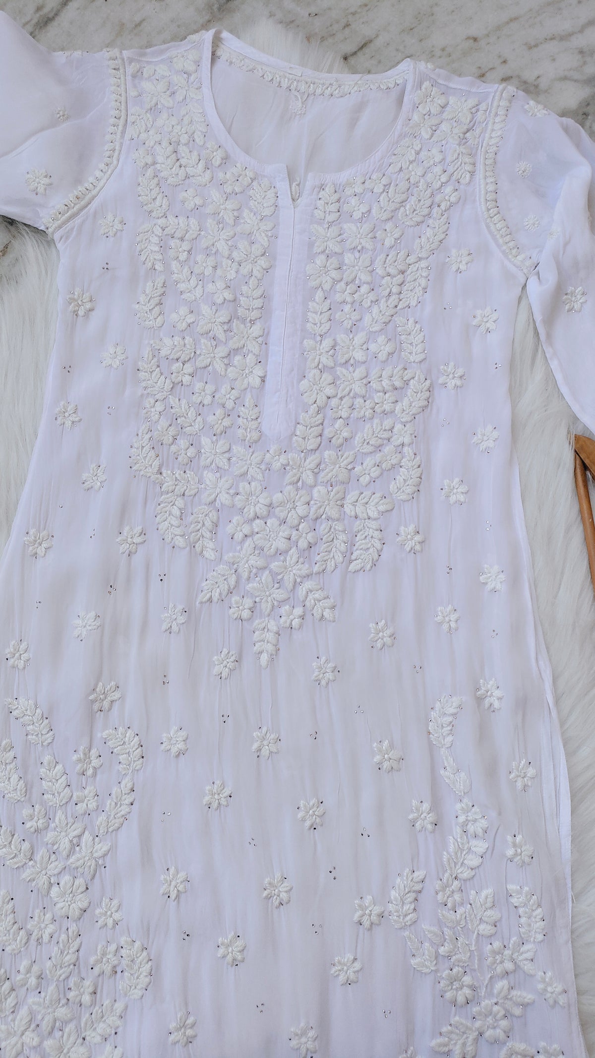 Handmade Safed Premium Georgette Chikankari long kurta with Kamdani embellishments from LVW Fashions, featuring intricate Lucknow chikankari.