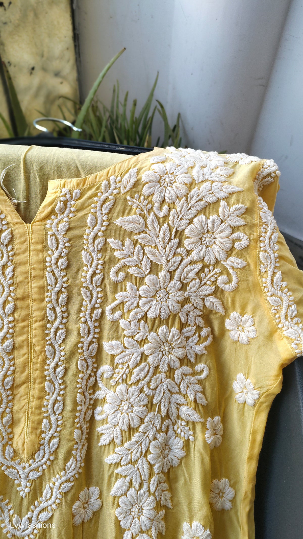 Handmade silk Chikankari long kurta with intricate panel embroidery from LVW Fashions, featuring traditional Lucknow Chikankari design.