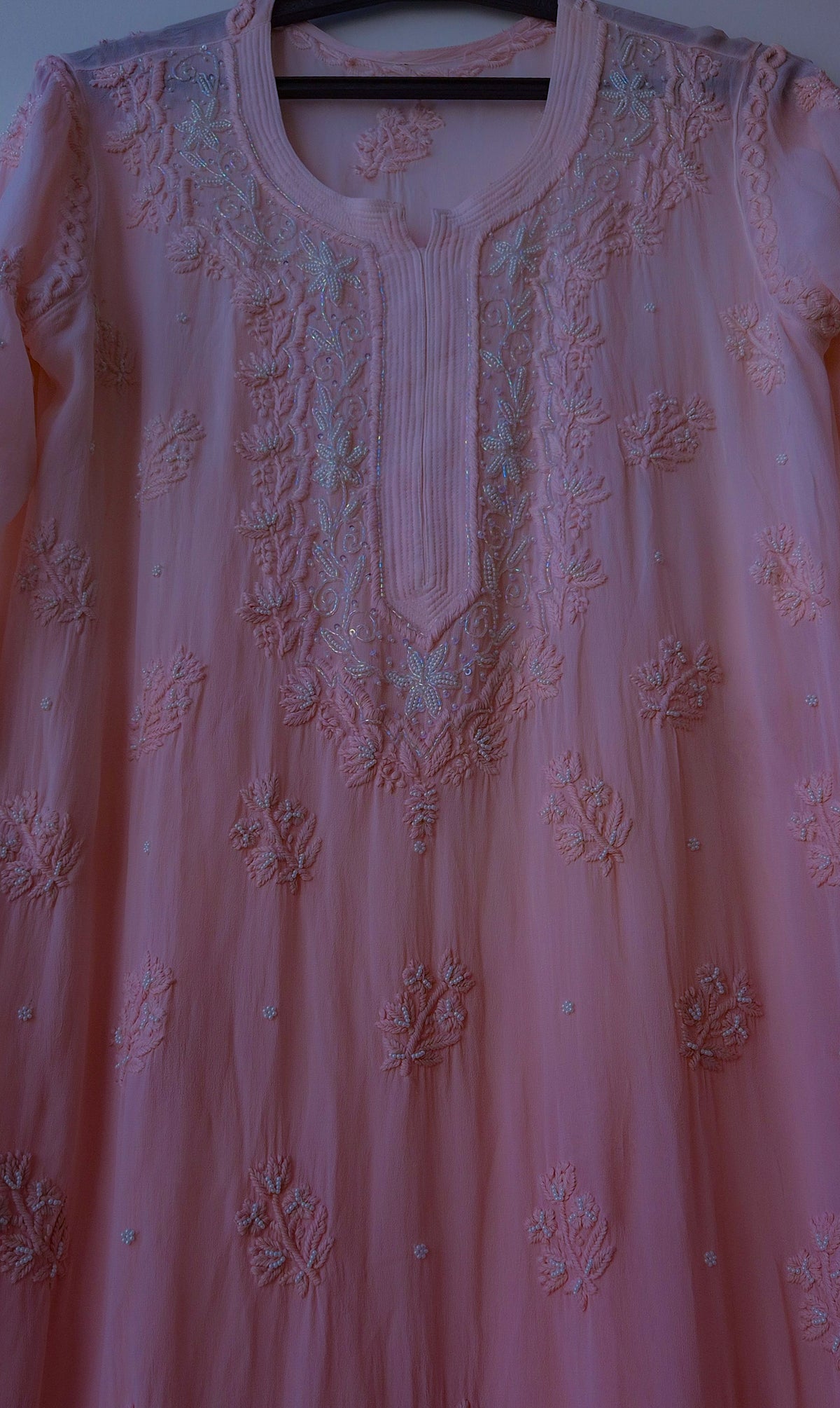 Soft peach Noori Pearls LVW Fashions handmade Chikankari kurta with premium georgette, cutdana embroidery, and Lucknow craftsmanship.