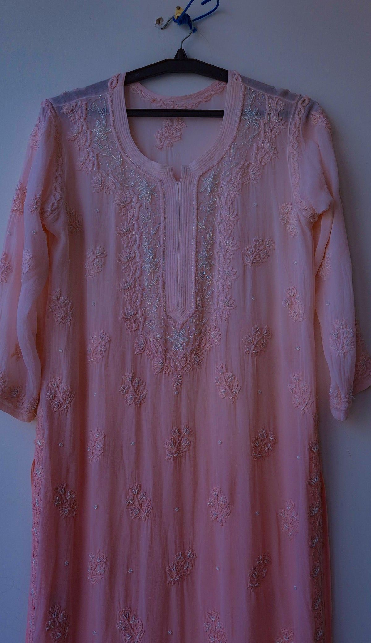 Soft peach Noori pearls and intricate cutdana embroidery on LVW Fashions handmade georgette Chikankari kurta with Lucknow craftsmanship.