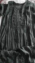 Black silk long kurta with intricate sunflower chikankari embroidery from LVW Fashions, handmade in Lucknow.