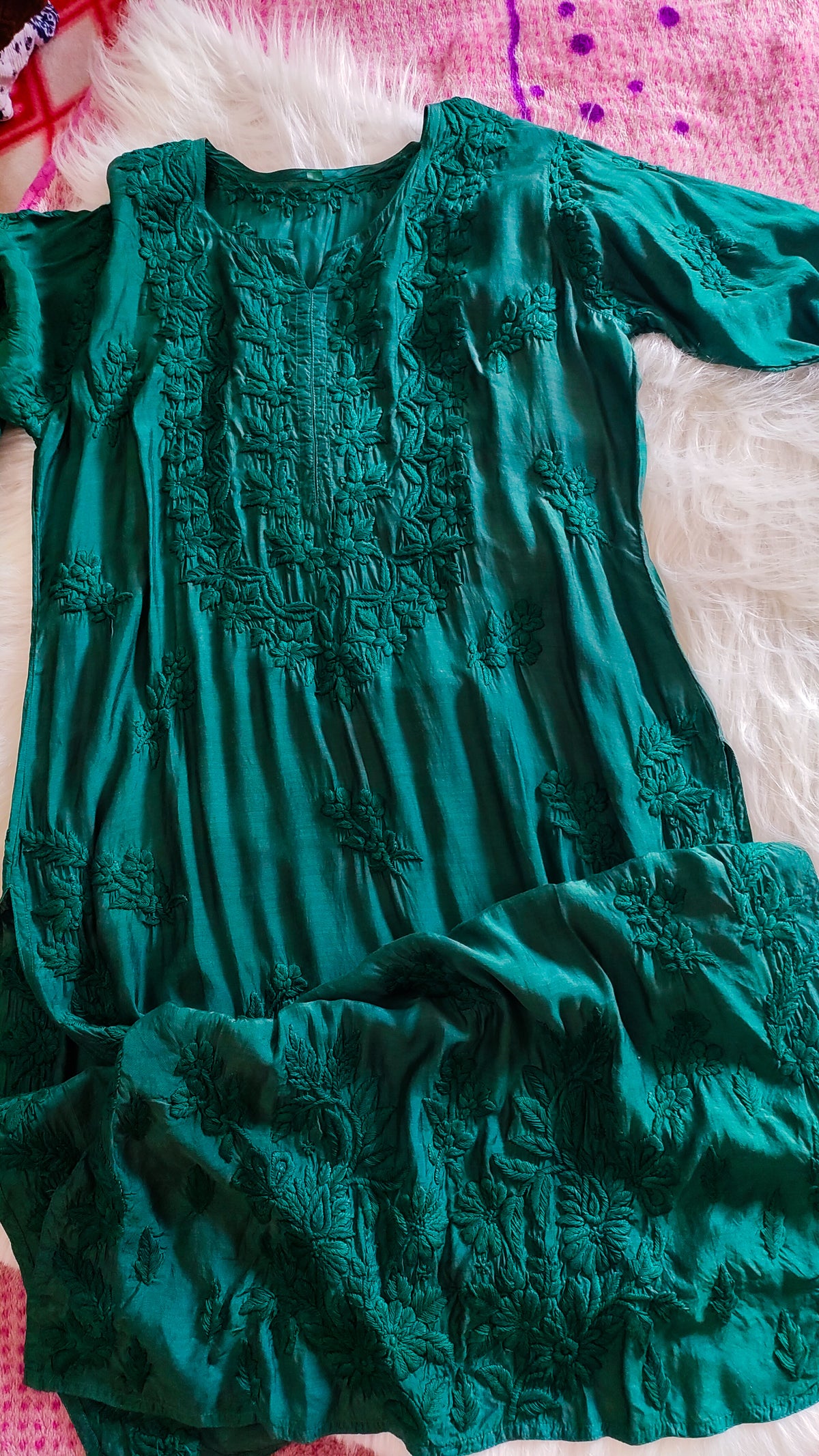 Green silk long kurta with intricate white chikankari embroidery, luxurious handmade design by LVW Fashions.