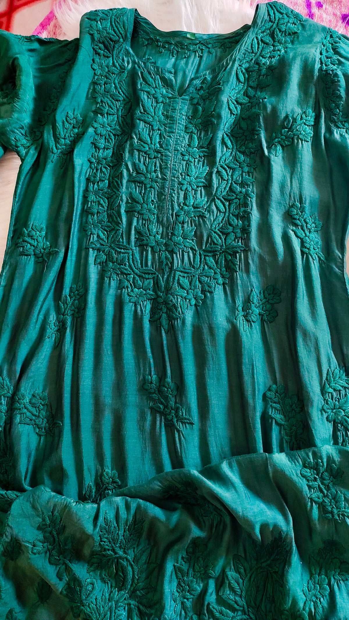 Luxurious green silk long kurta with intricate white chikankari embroidery, handmade by LVW Fashions in Lucknow.