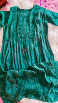 Green silk long kurta with intricate sunflower shine chikankari embroidery from LVW Fashions, handmade luxurious Lucknow Chikankari.