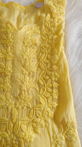 Yellow silk long kurta with intricate white chikankari embroidery, luxurious and handmade by LVW Fashions, featuring sunflower shine design.