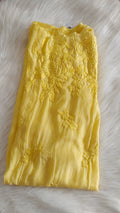 Yellow silk long kurta with intricate Lucknow chikankari embroidery, luxurious handmade design by LVW Fashions.