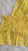 Yellow silk chikankari long kurta with sunflower shine design, handmade by LVW Fashions, featuring luxurious Lucknow embroidery.