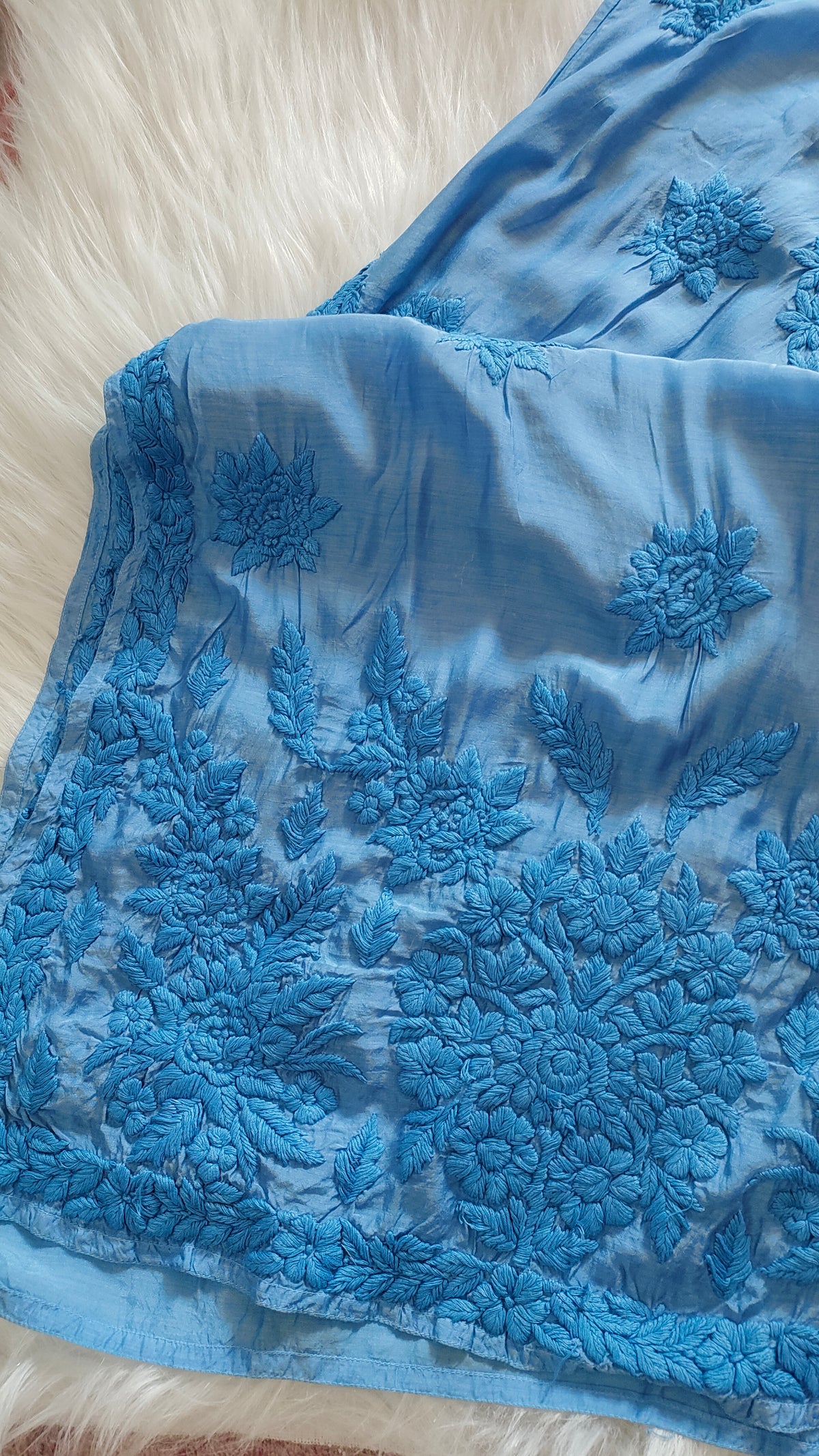 Sunflower soft blue silk long kurta with intricate handmade Lucknow chikankari embroidery by LVW Fashions.