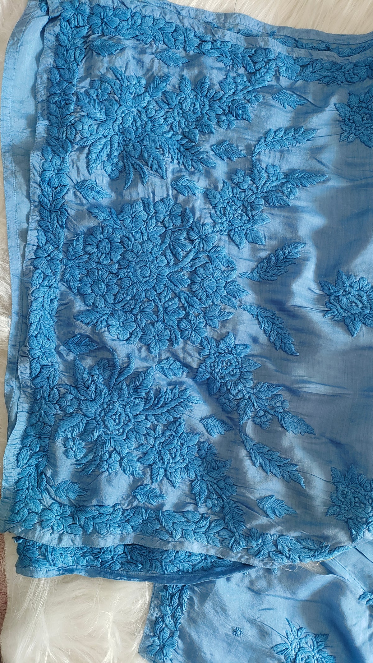Sunflower soft blue silk long kurta with intricate handmade Lucknow chikankari embroidery by LVW Fashions.