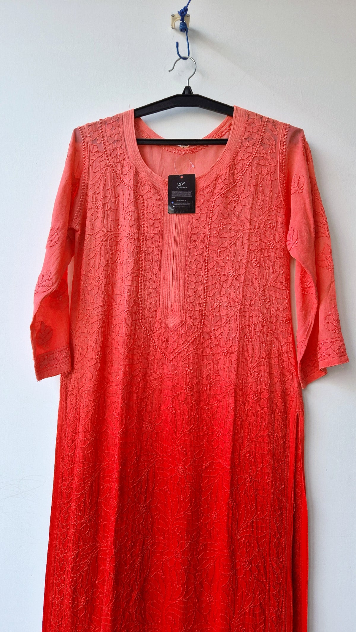 Sunset orange LVW Fashions handmade Georgette Chikankari long Kurti with intricate Lucknow-style embroidery.