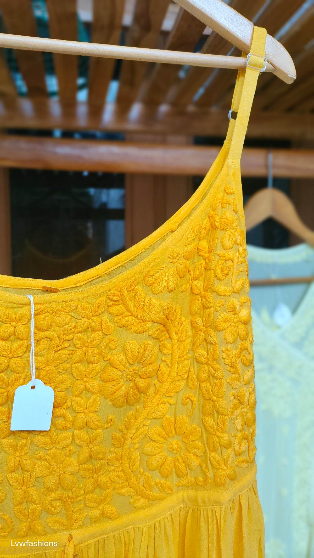 LVW Fashions Tulip Tunic in premium georgette with intricate Lucknow chikankari embroidery and adjustable straps.